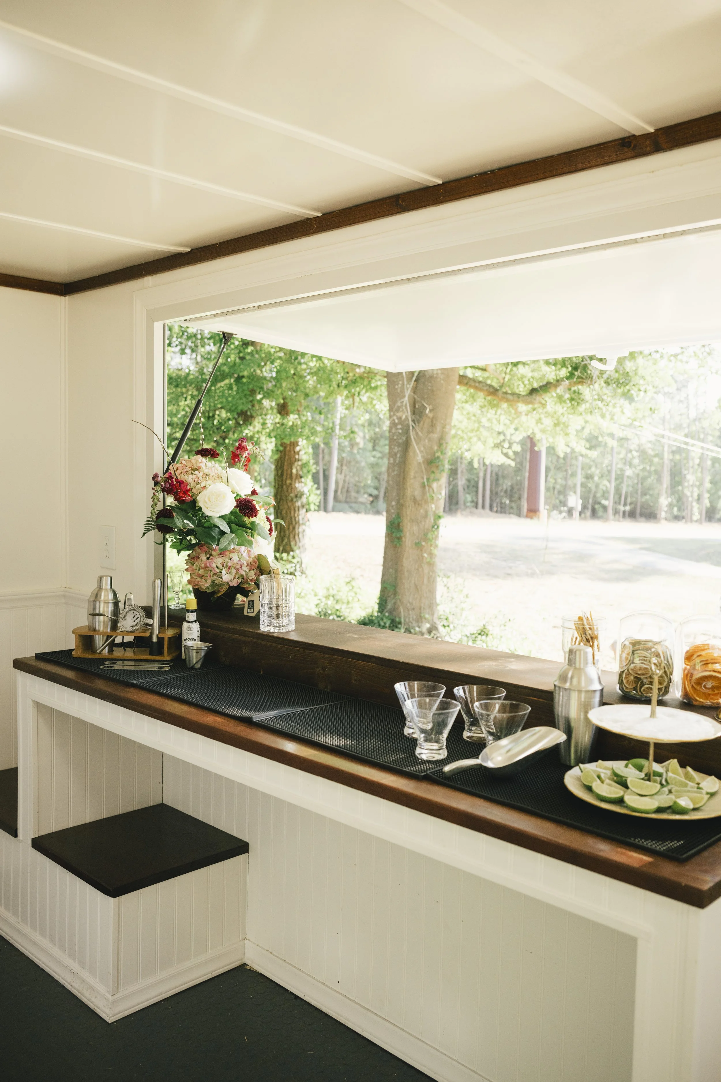 Vintage 1963 white rv mobile bar for weddings and private events based in Aiken SC | Serving Charleston, Columbia, Greenville SC areas