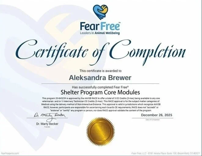Certificate of completion from Fear Free for Aleksandra Brewer for Shelter Program Core Modules, dated December 26, 2025.