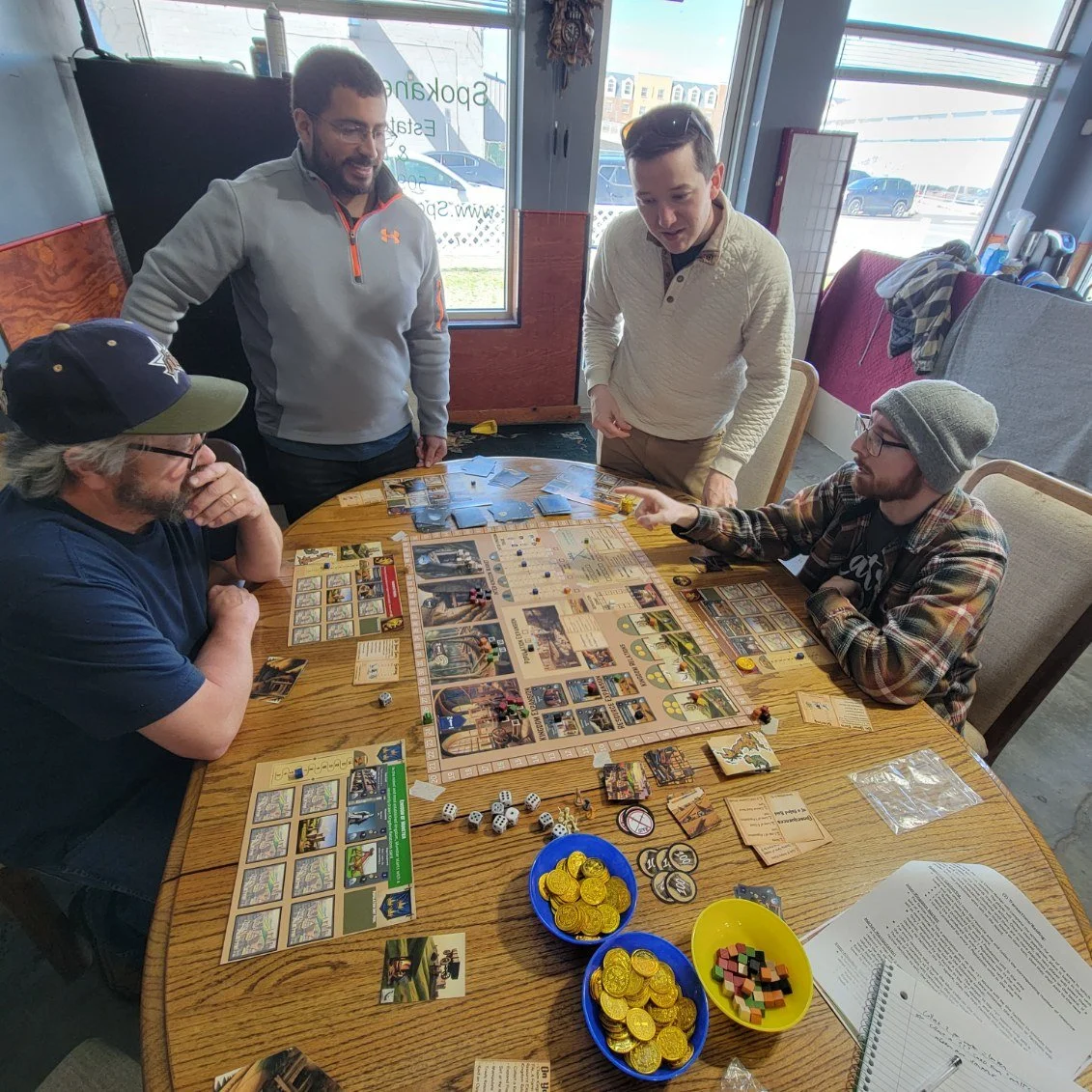 A group of adults playing a thrilling game of Tides Of War