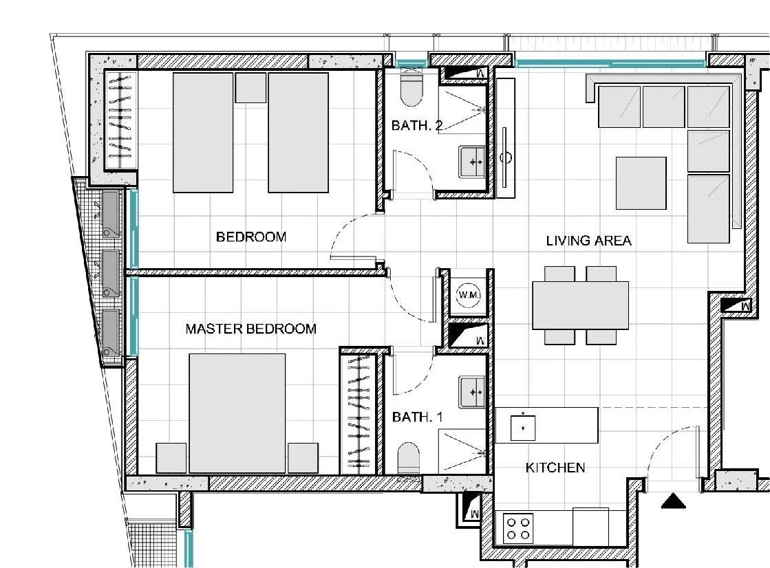 Floor plan of an apartment with two bedrooms, two bathrooms, a kitchen, a living area, and laundry space.
