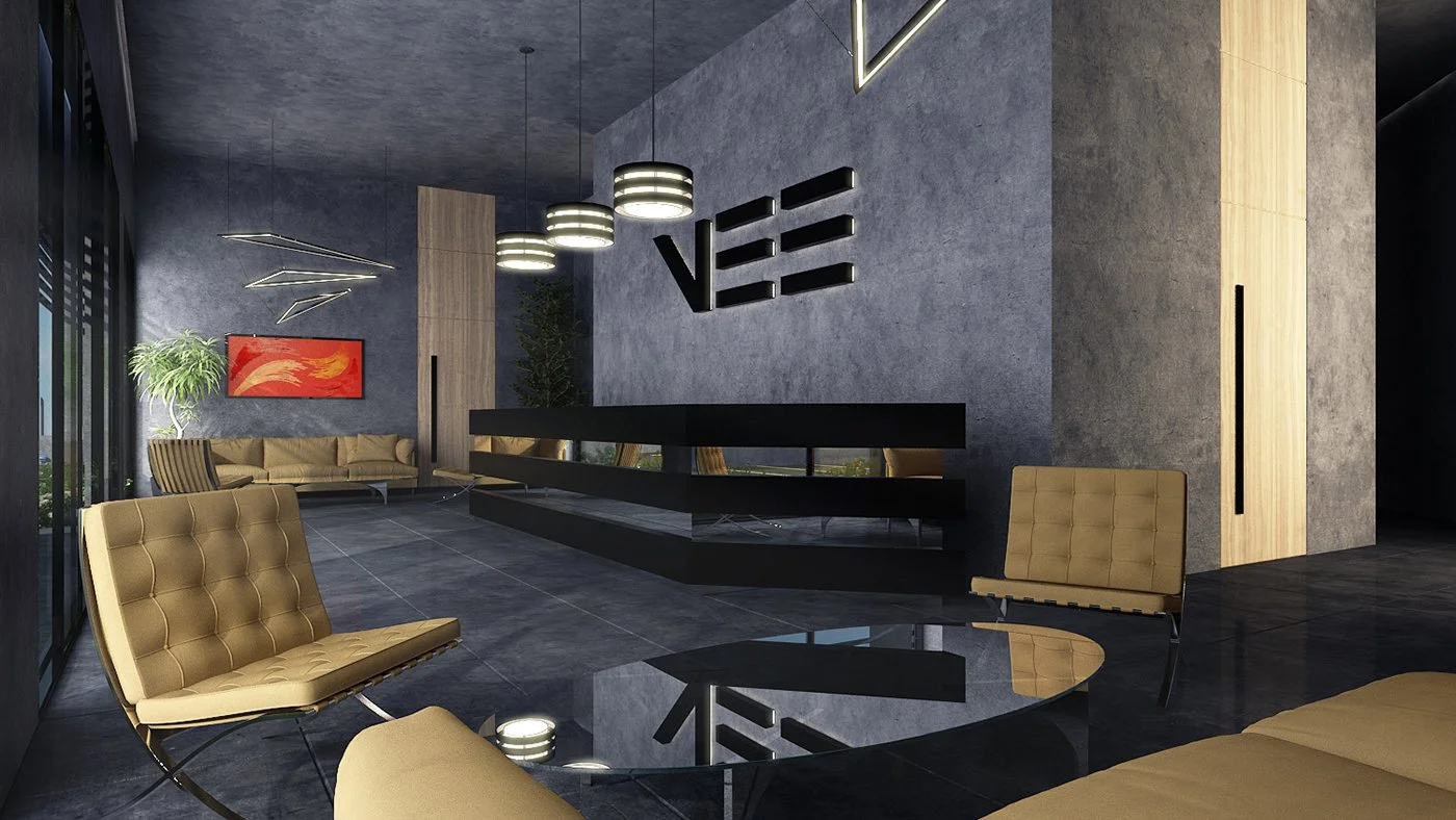Modern lobby with dark grey walls, gold seating, and contemporary lighting fixtures. The reception desk is black, and the decor includes a large red abstract painting and green plants.