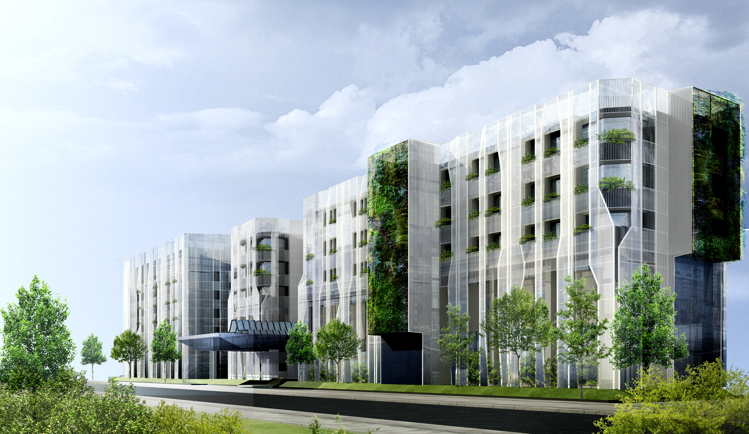 Modern architectural building with glass and greenery, surrounded by trees under a cloudy sky.
