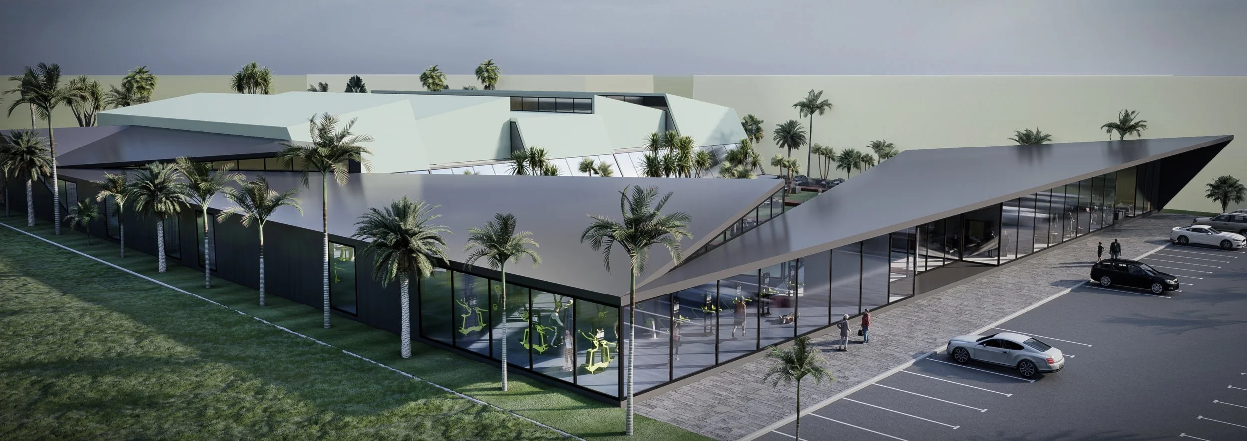 A modern gym building with a glass exterior, surrounded by palm trees and a parking lot with cars and people walking.