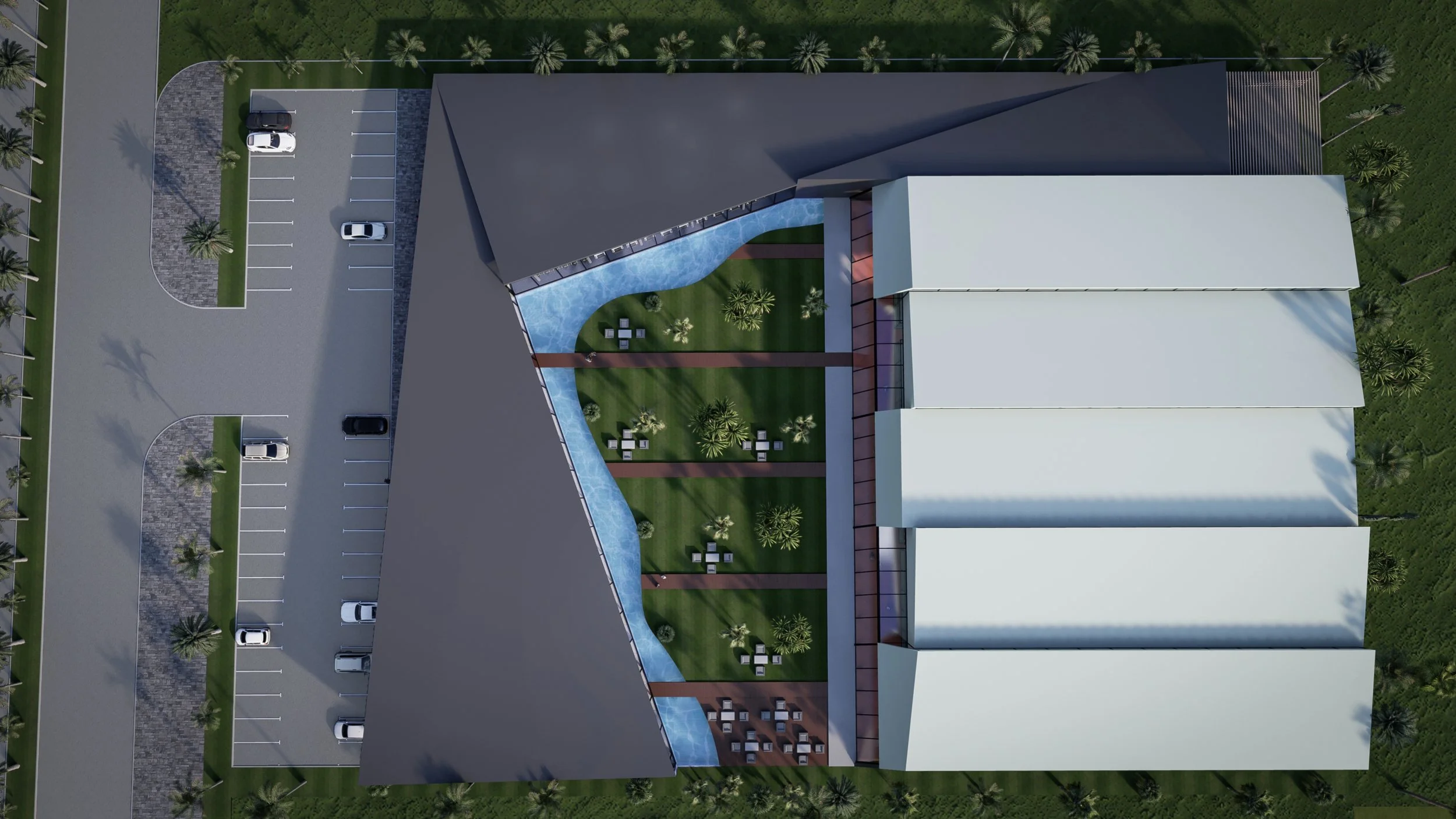 Aerial view of a modern building with a curved pool area, green lawn, outdoor seating, parking lots, and palm trees surrounding the area.