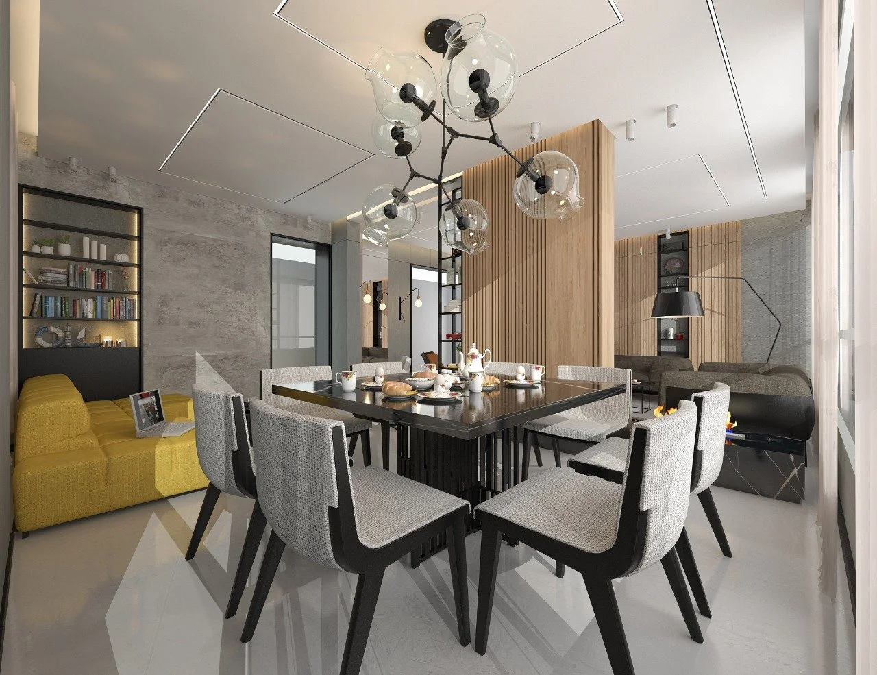 Modern dining room with a dark wood table, grey upholstered chairs, a yellow sofa, and a black fireplace. Bright natural light from large windows, contemporary chandelier, and wooden accents.