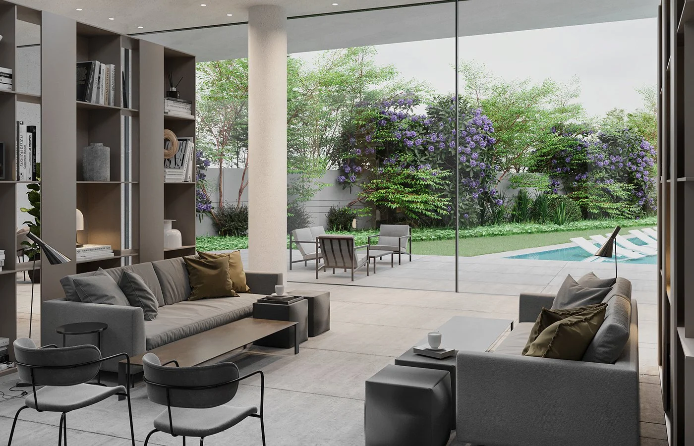 A modern living room with large glass sliding doors opening to a backyard with purple flowering bushes, small trees, and outdoor furniture including white lounge chairs near a swimming pool.