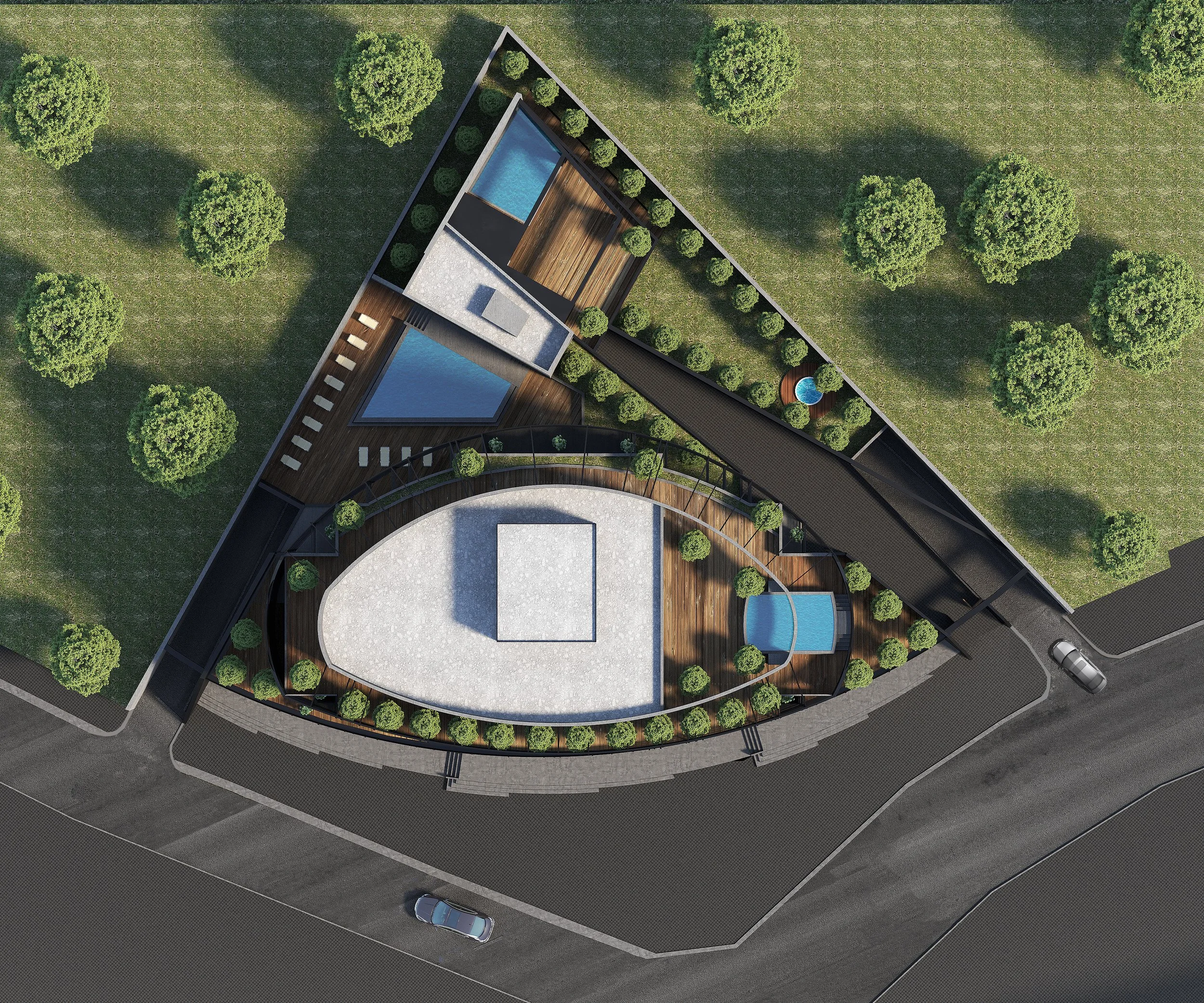 Aerial view of a modern, uniquely shaped building with multiple pools, outdoor seating, trees, and landscaped areas, situated near a road.