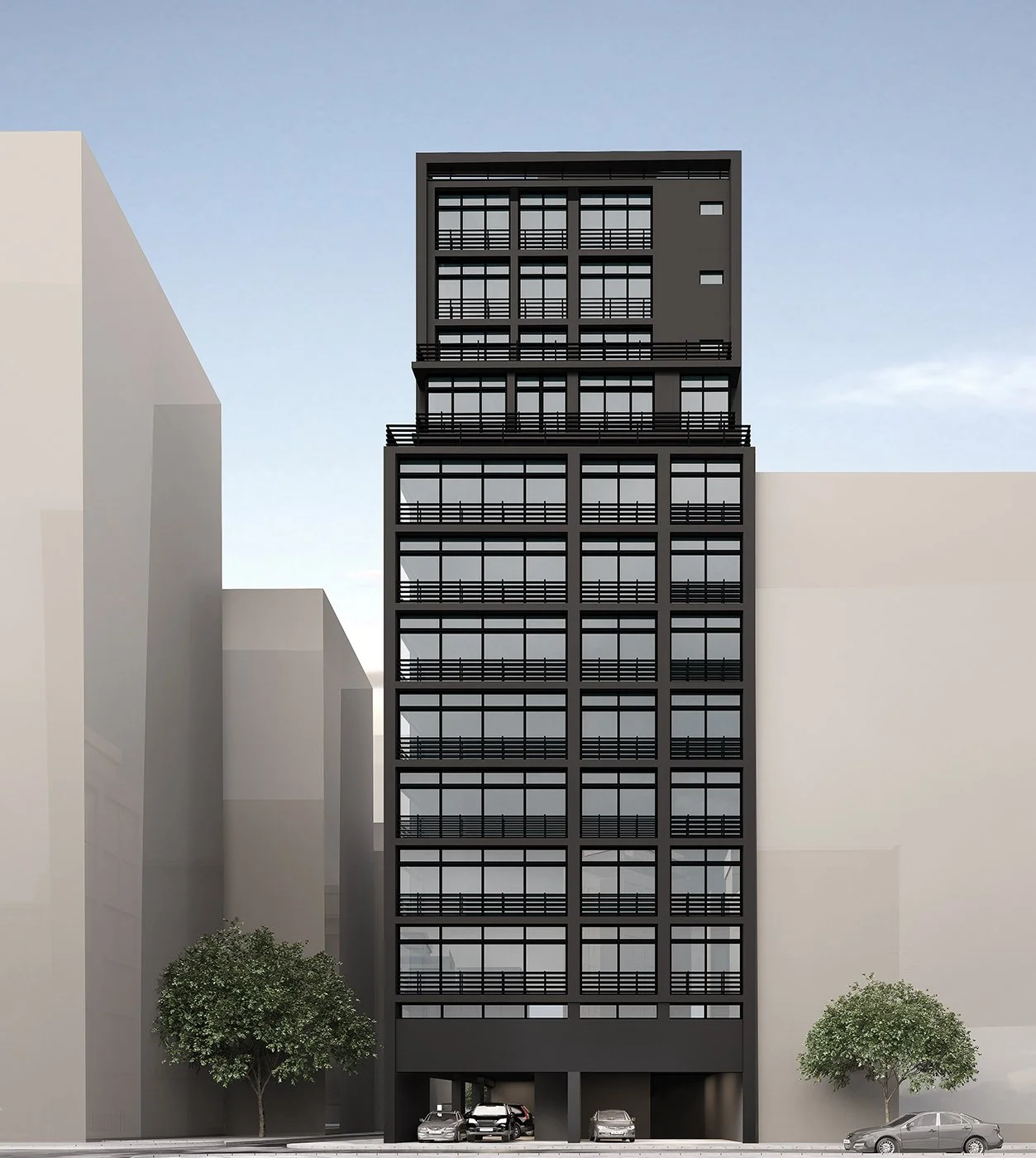 A modern multi-story black building with glass windows and balconies, situated between two light-colored structures with parked cars and trees at the base.