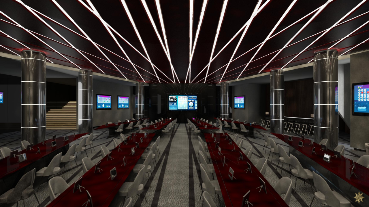 Casino gaming room with multiple tables, digital screens on walls, and LED lighting on ceiling.