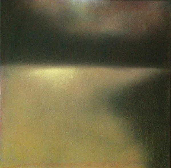 Das Bild zeigt eine farblich verschwommene, dunkle und helle Fläche ohne erkennbare Objekte.