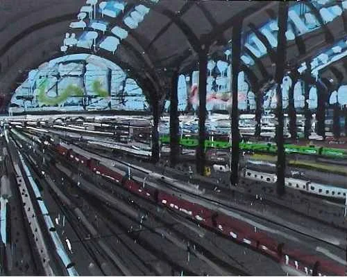 Ein Blick in eine U-Bahn-Station mit mehreren Gleisen und einem Tunnel aus Stahl, durch den Züge fahren.