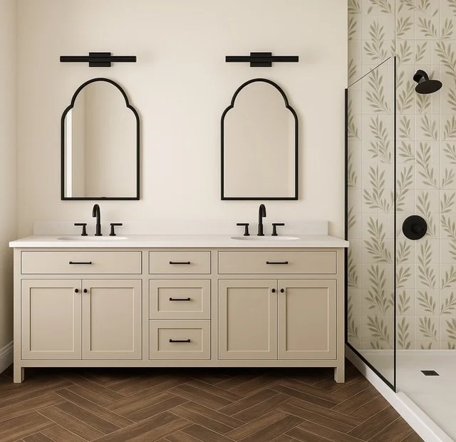 Modern bathroom vanity with double sinks, two black framed mirrors, black light fixtures, and a walk-in shower with a glass door and patterned tile wall.