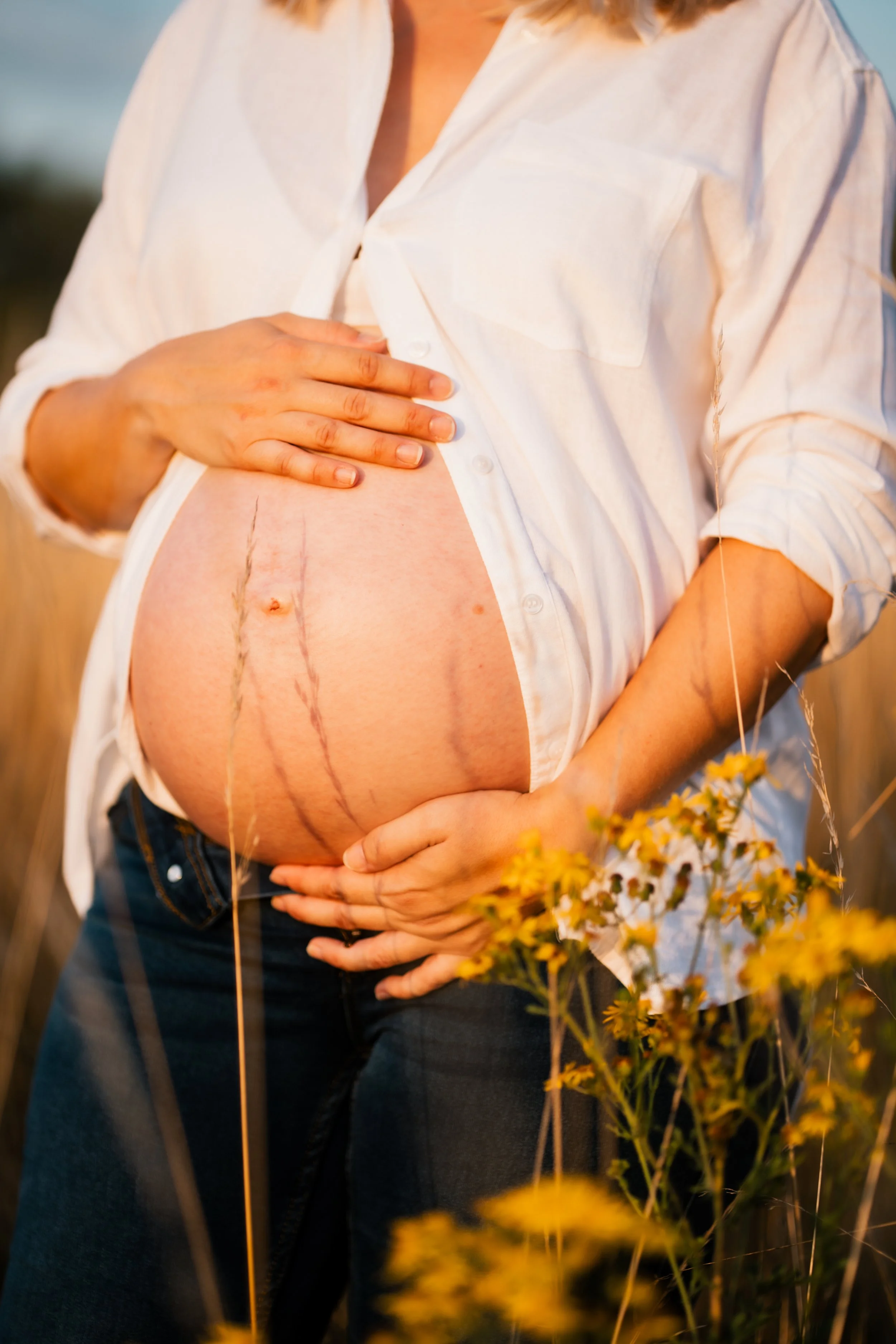 Zwangerschaps fotoshoot zonsondergang.jpg
