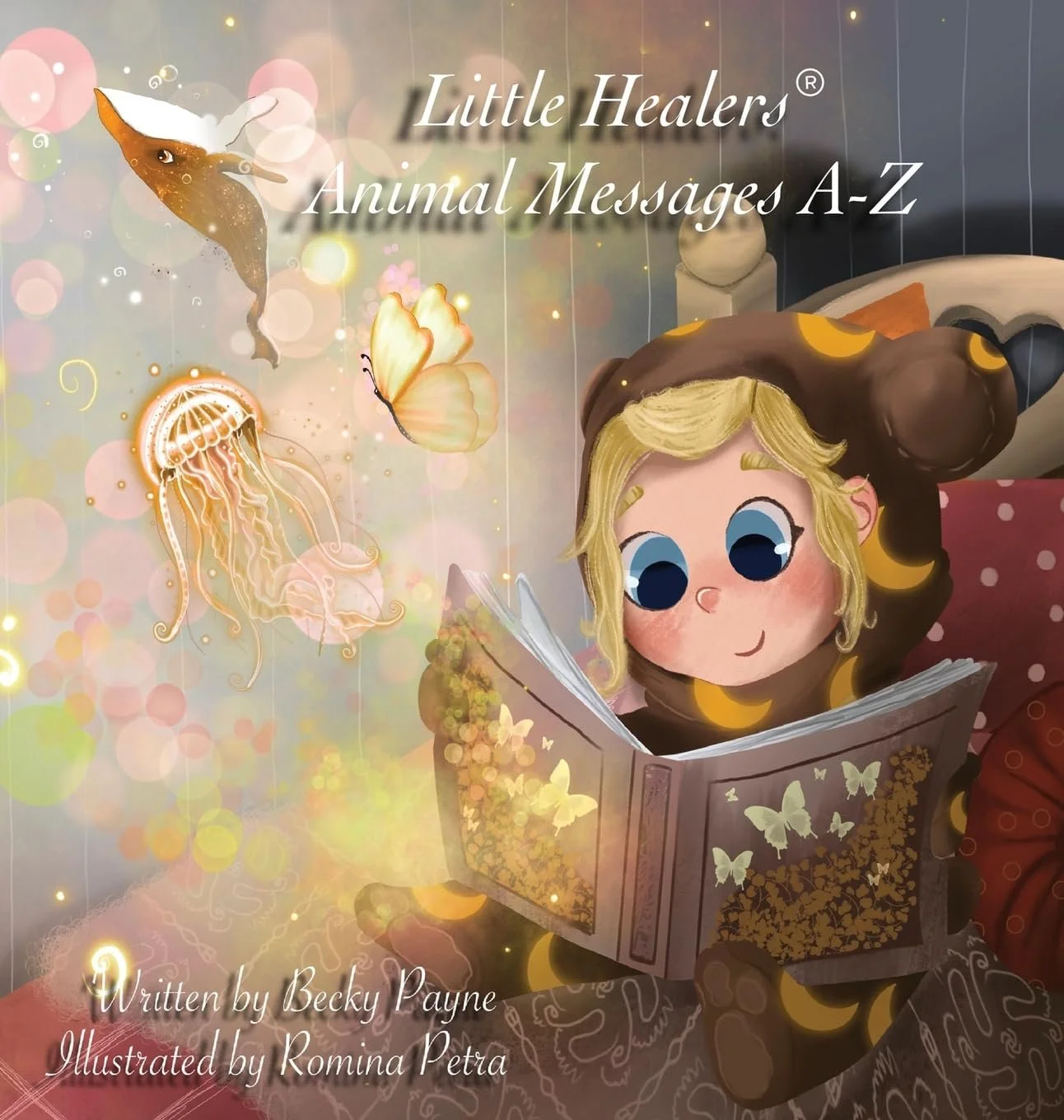 A cartoon illustration of a young girl with blonde hair and big blue eyes wearing a brown hoodie with yellow moons, sitting on a bed and reading a book. The background features glowing fish, jellyfish, a butterfly, and sparkling lights, creating a whimsical and magical atmosphere.