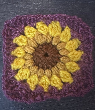 Grace sunburst square.png