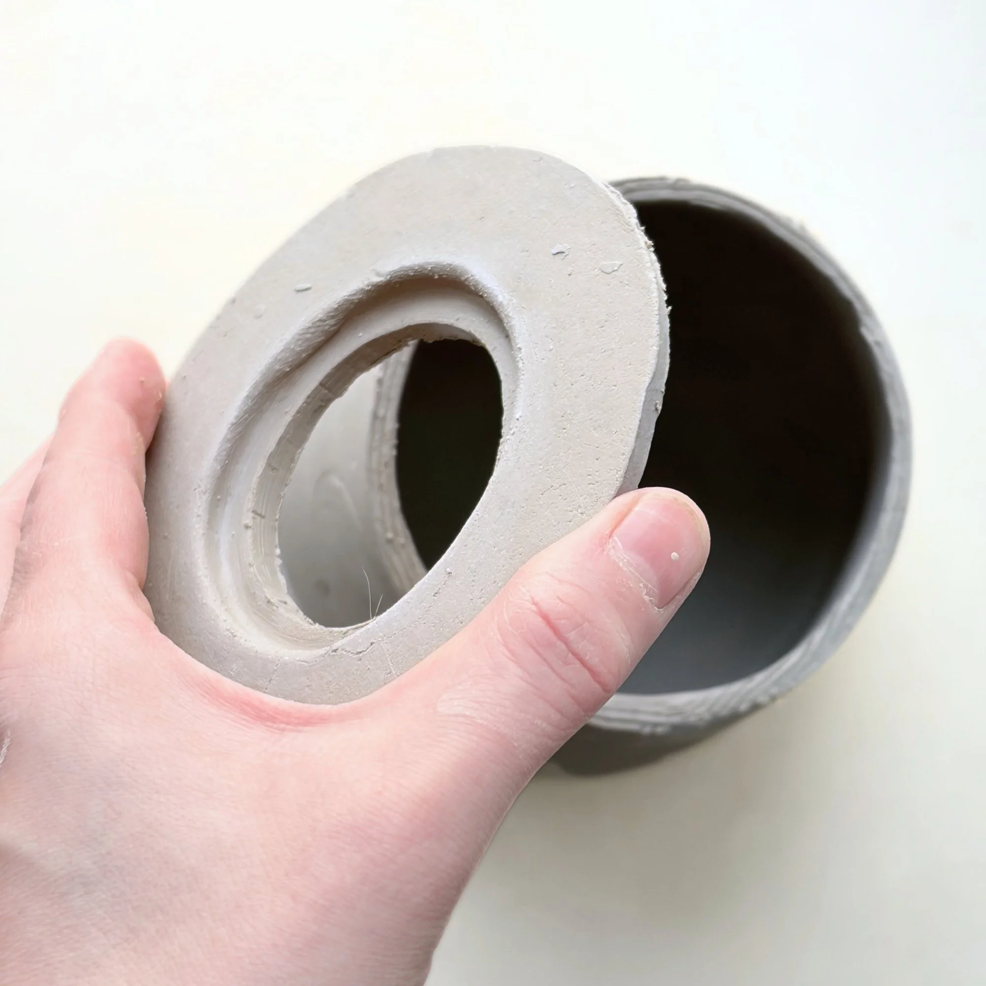 assembly of the top with a gallery for the lid, making a slab-build teapot using a teapot pottery template.