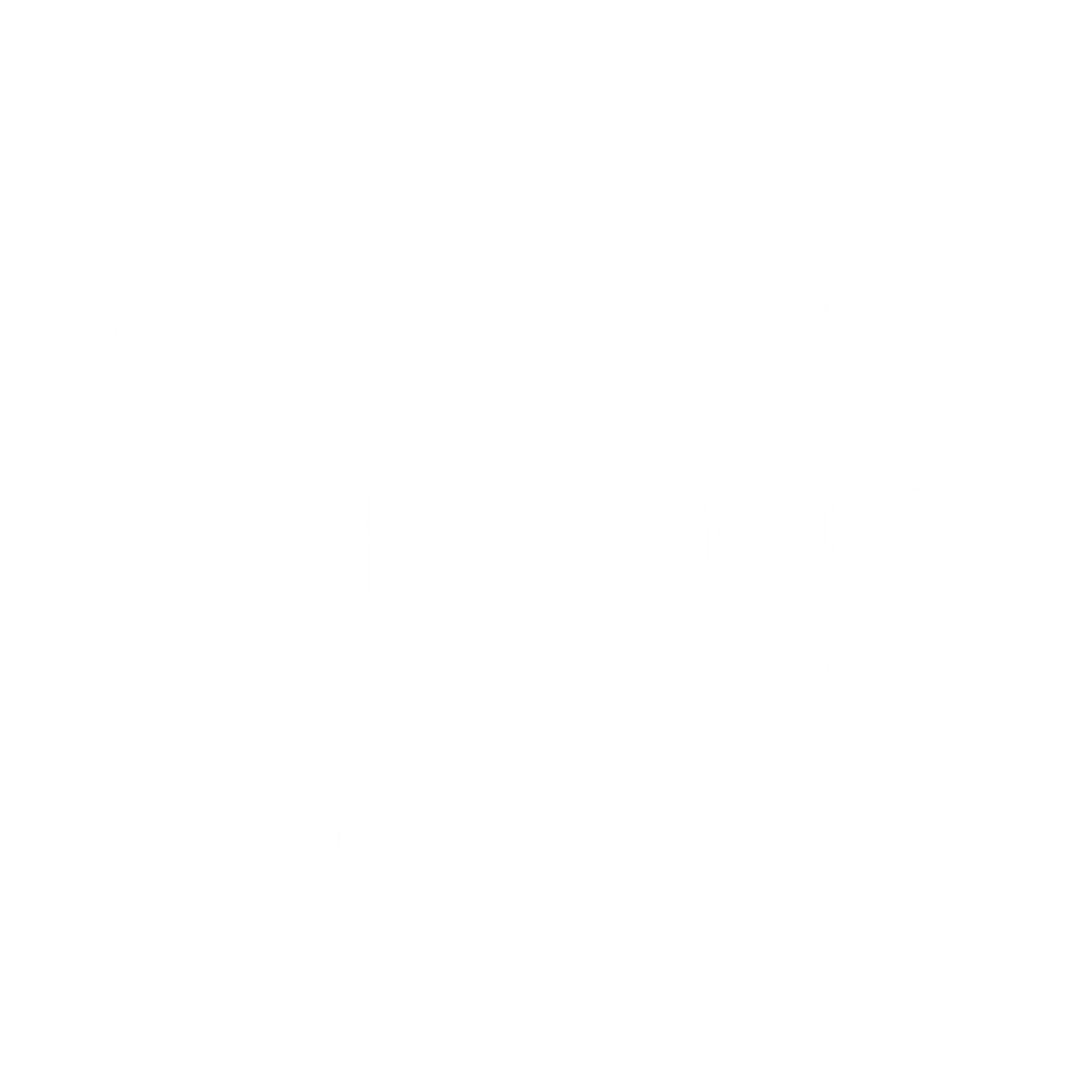 Silhouette of a city skyline with various building shapes and heights.