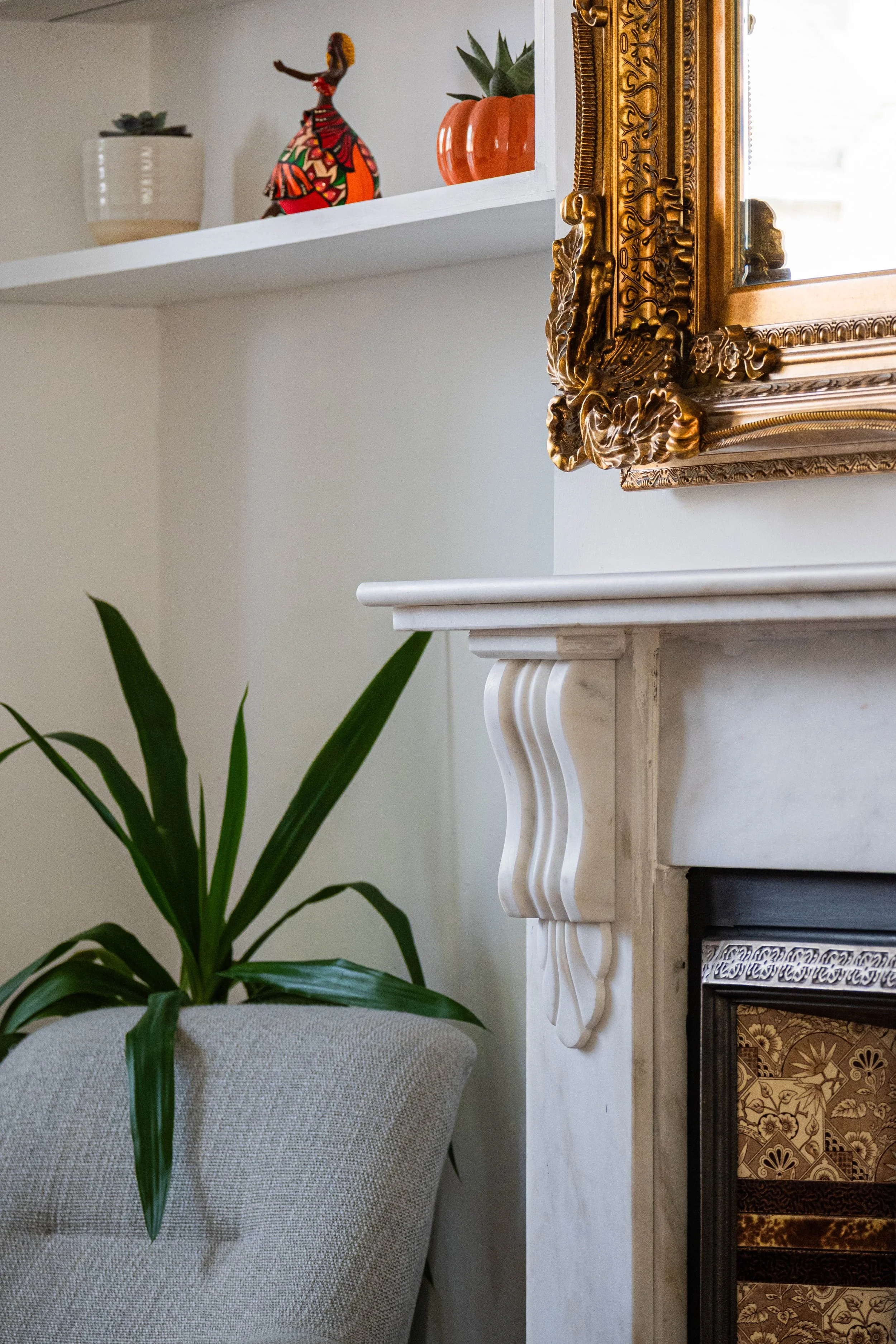 detail of a Victorian fireplace mantel