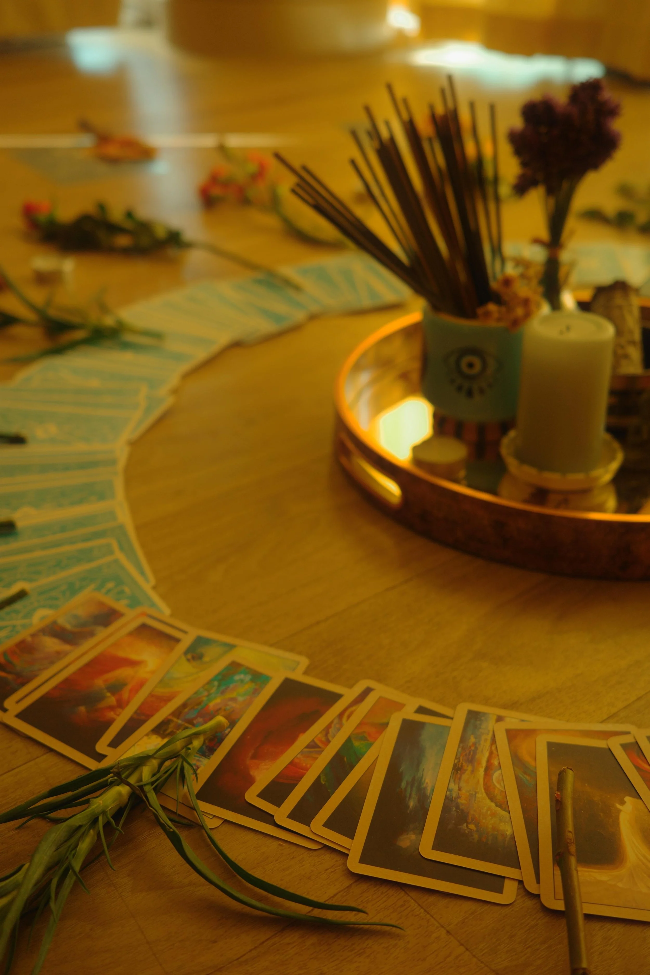 Full moon reiki circle altar with flowers and arot cards