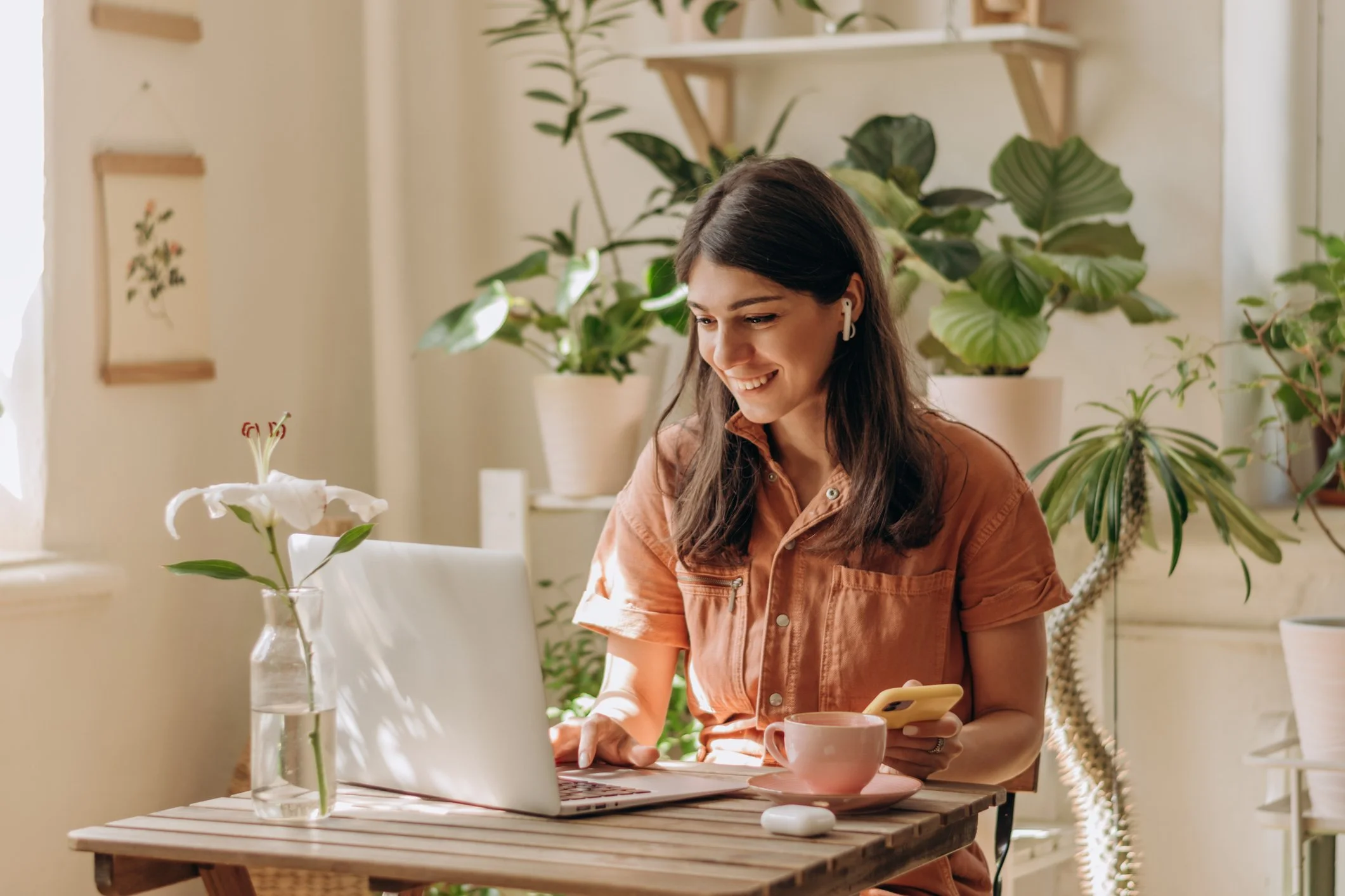 Relaxed ADHD adult working happily at home on computer