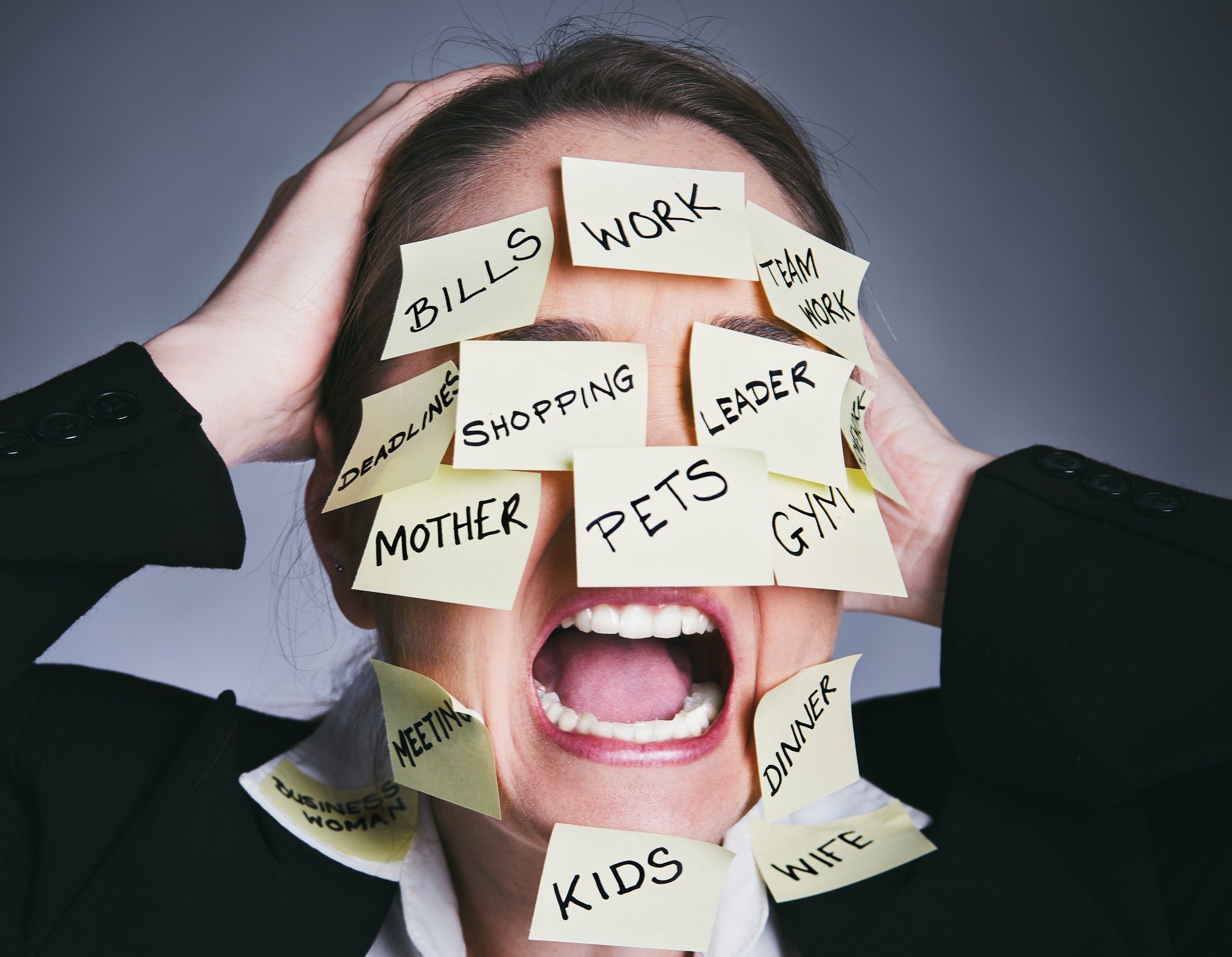 stressed ADHD woman with to-do items stuck on face