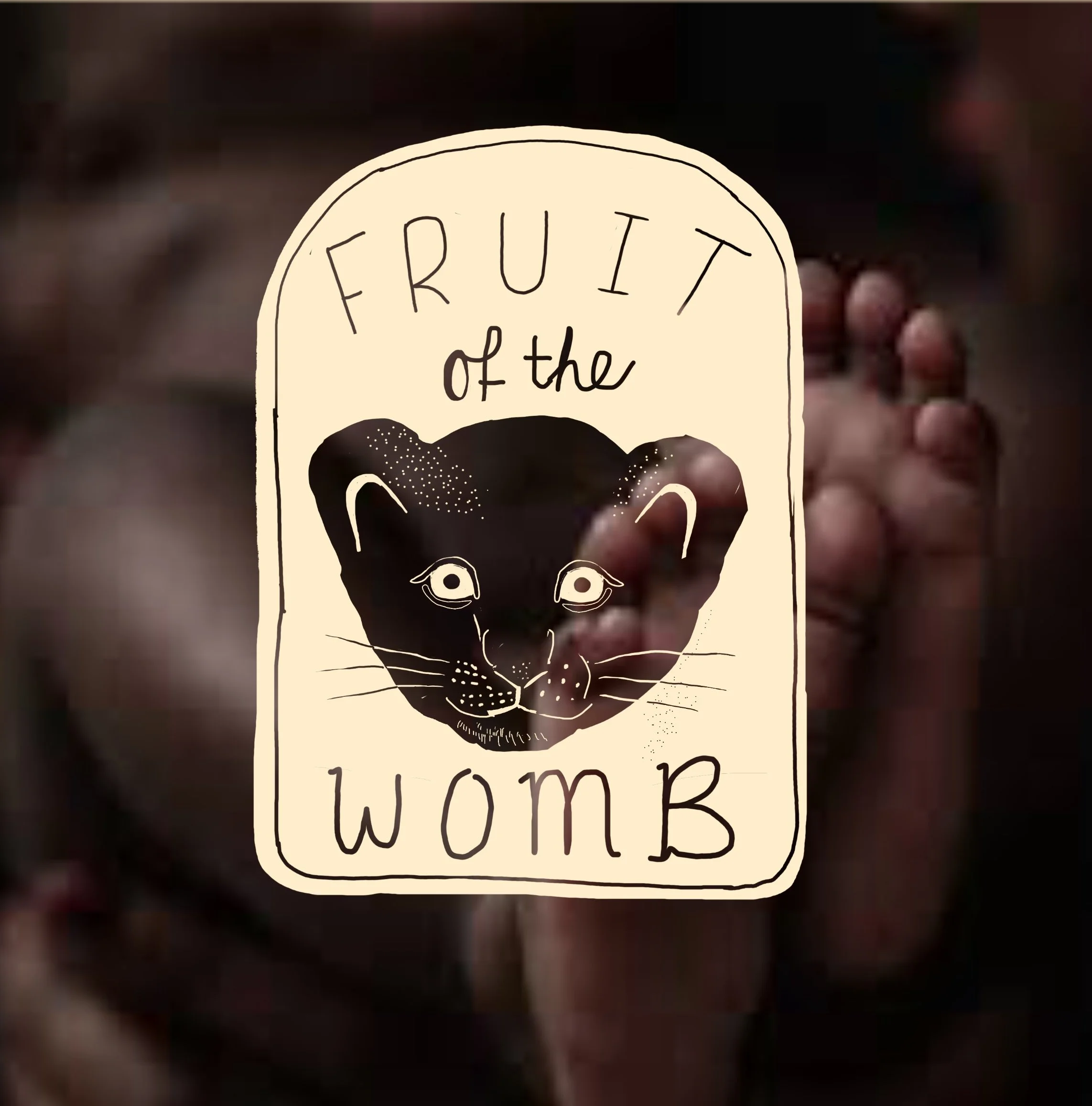 A drawing of a skull with the words "Fruity of the Womb" written above it.