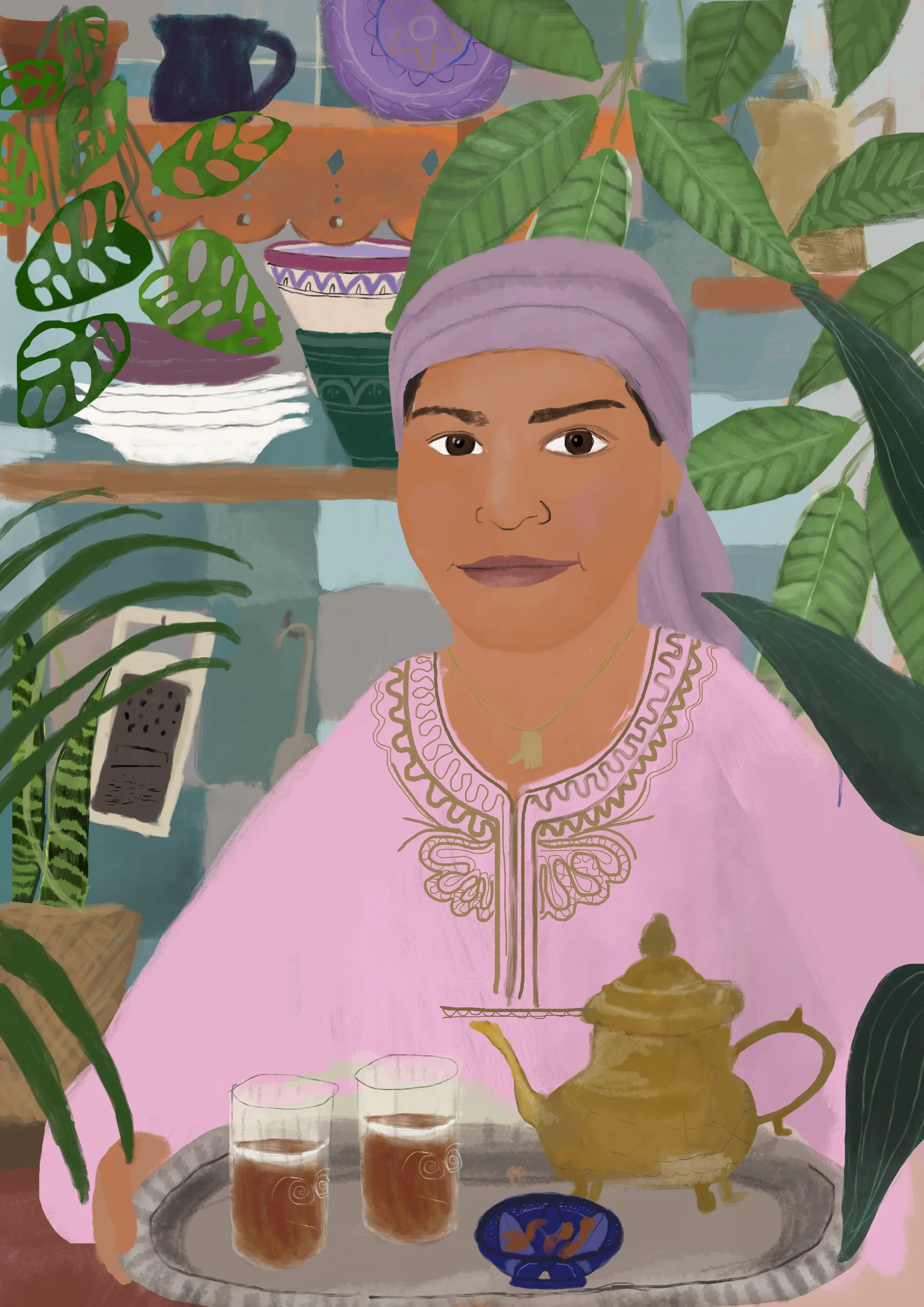 A woman in a pink traditional dress and lavender headscarf sitting at a table with a tea pot, two glasses of tea, and a small blue dish of cookies, surrounded by green plants indoors.