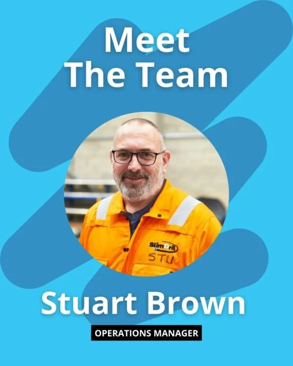 A promotional graphic featuring Stuart Brown, the operations manager, wearing an orange safety jacket with the logo Slim Dri. The background is a bright blue with abstract shapes, and the text says "Meet The Team" at the top and "Stuart Brown" with his title at the bottom.