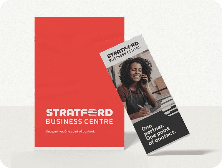 Mockup of a poster and brochure on a light-colored surface