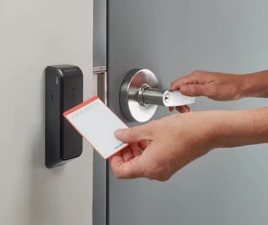 Commercial access control card reader and door hardware used for secure, code-compliant entry in schools and commercial facilities