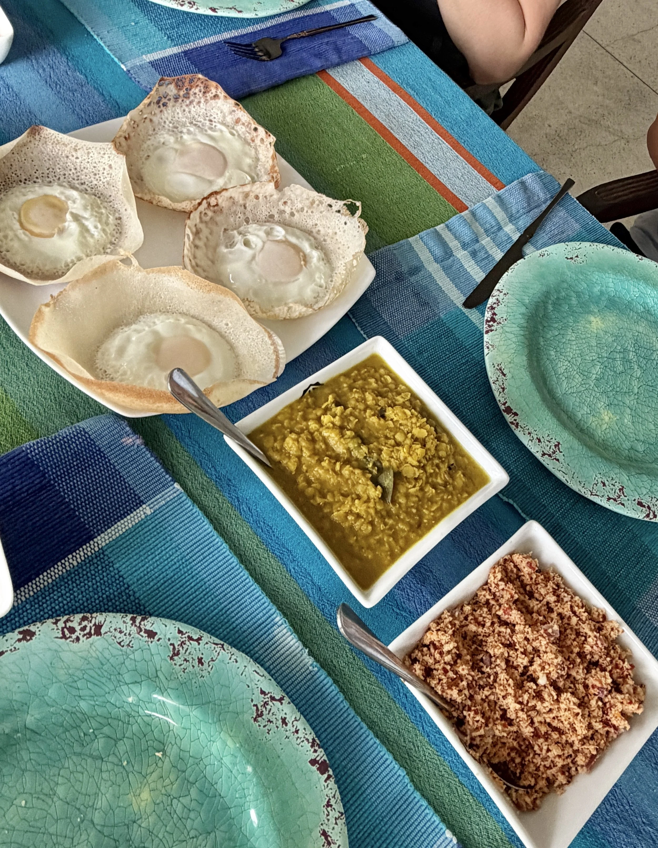 Sri Lankan breakfasts, especially Egg Hoppers (on the left).  Yummy eggs in basically a crepe bowl made from rice flour and coconut milk.