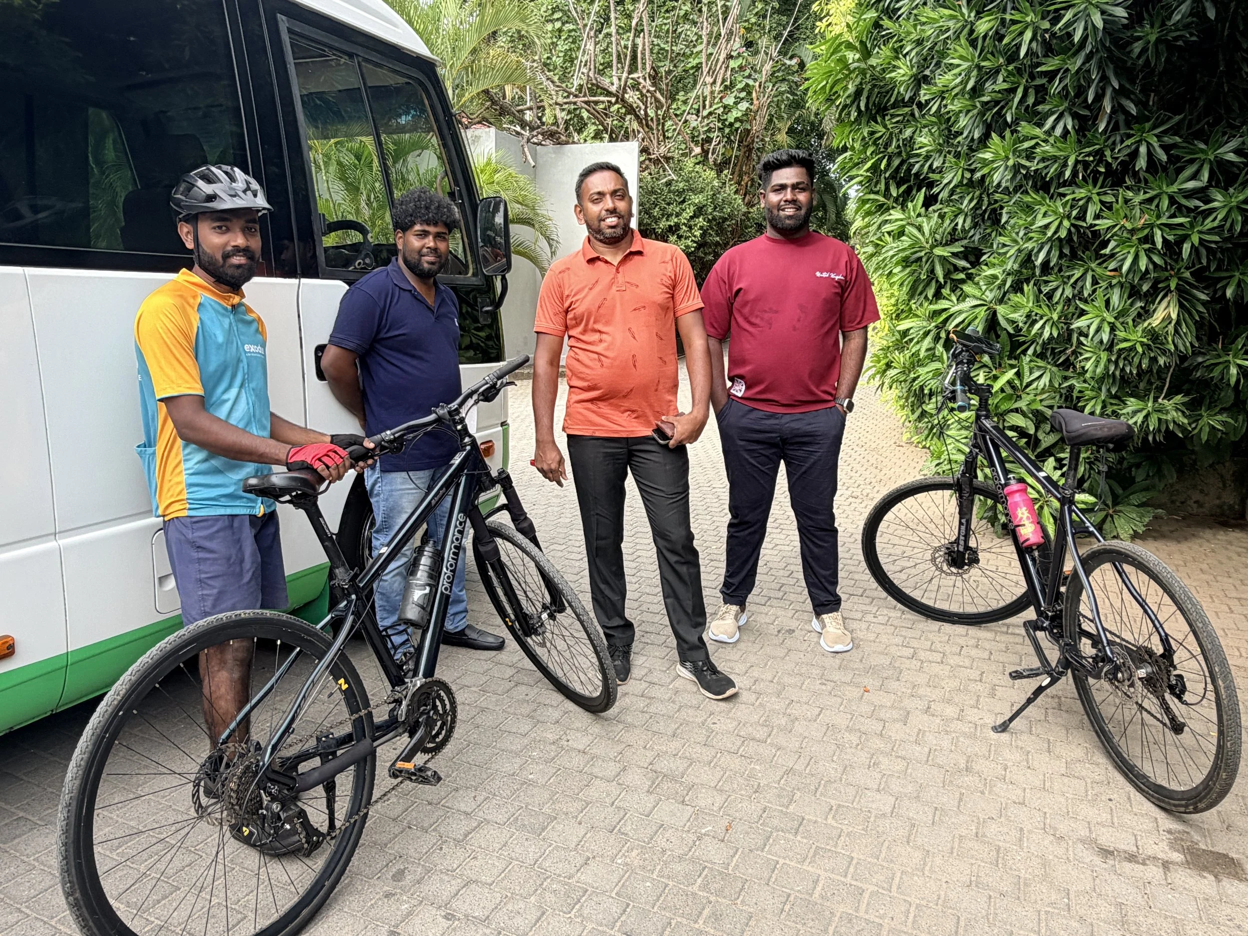 ....his amazing team: (L to R) the Sweep/Technician: Dinuka, the bus assistant: Ranishka, Bus Driver: Sameera, and the Truck Driver (for all our bikes): Ashan.  We couldn't have done it without their white glove treatment. 