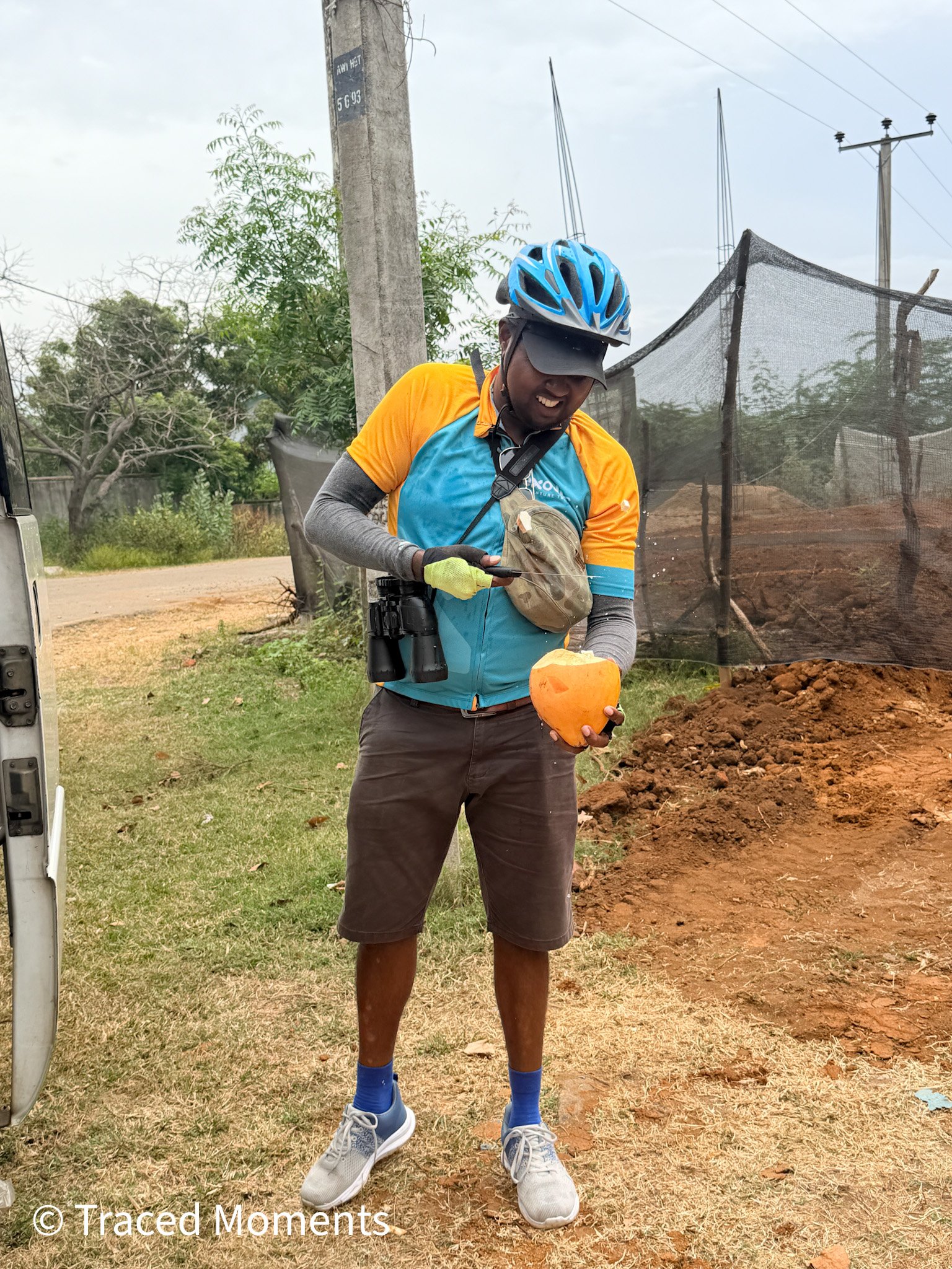 Waji, our guide, helping getting the coconuts ready for snack.