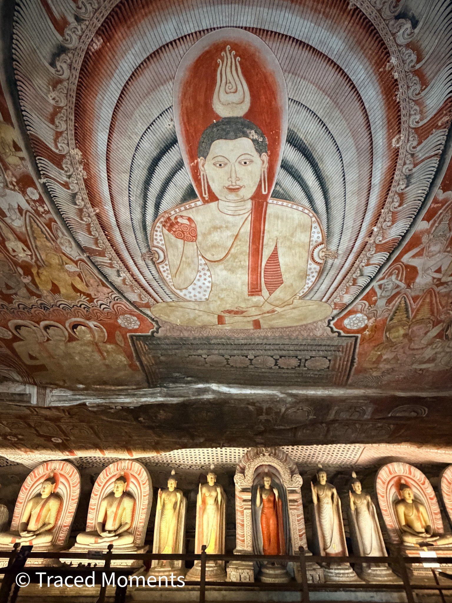 Richly painted walls and ceilings in one of the Dambulla caves.