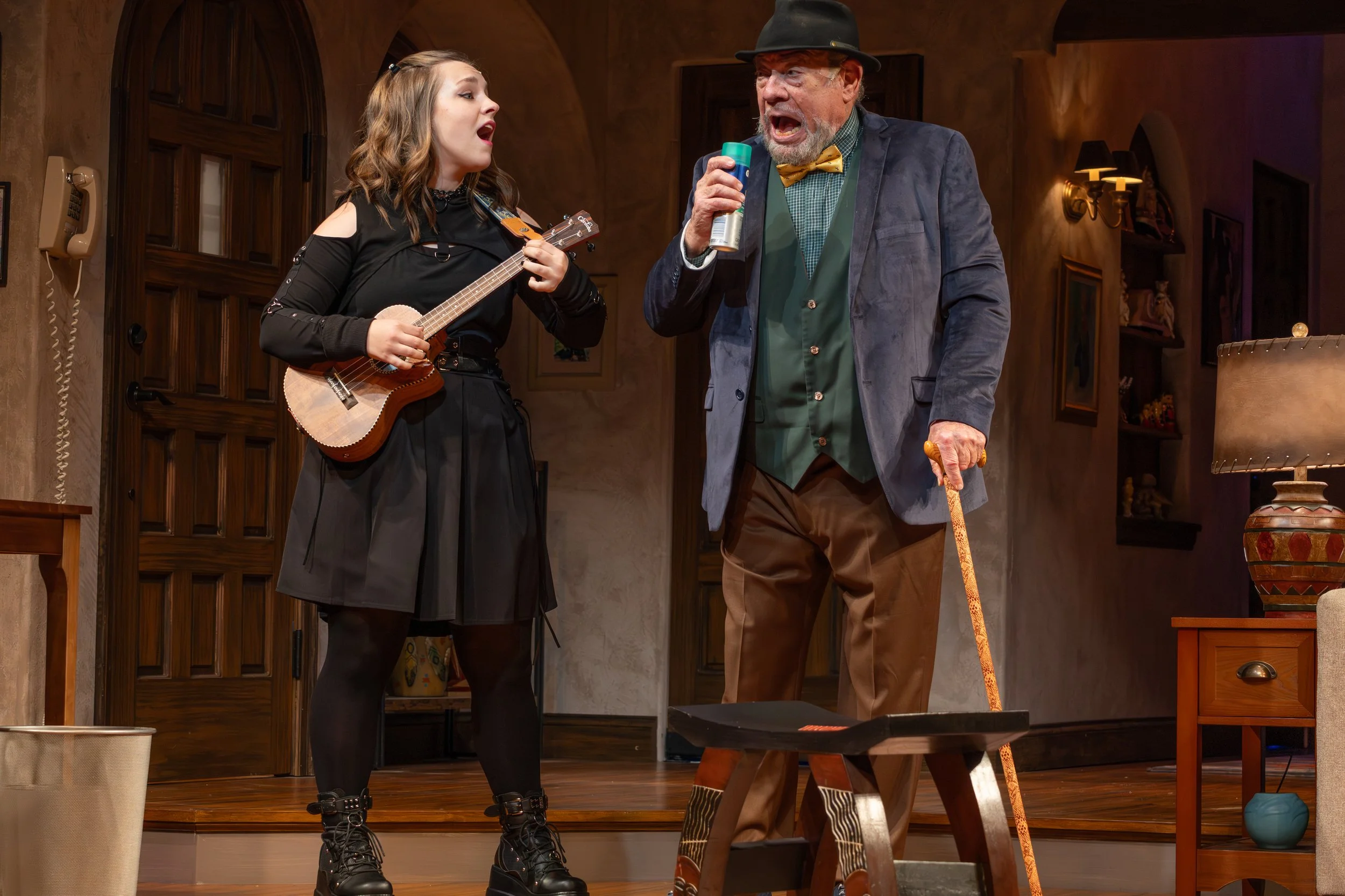 KyLee (Dee Dee Loftus) singing and playing ukulele with Victor Raider-Wexler (Gus Loftus) in NOBODY'S PERFECT at the New Theatre and Restaurant IN KC