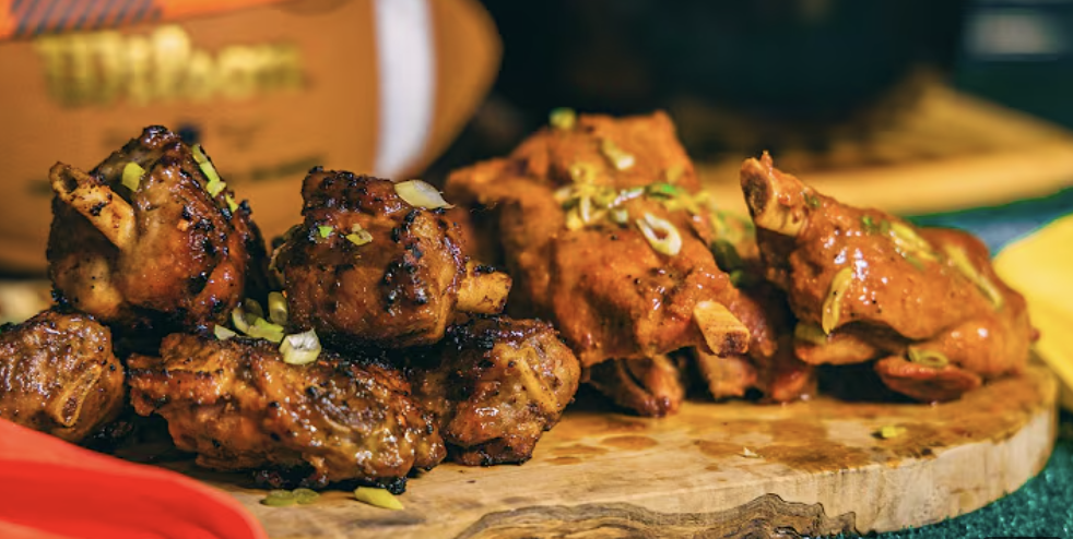 close up pig wings pork shanks bbq prepared