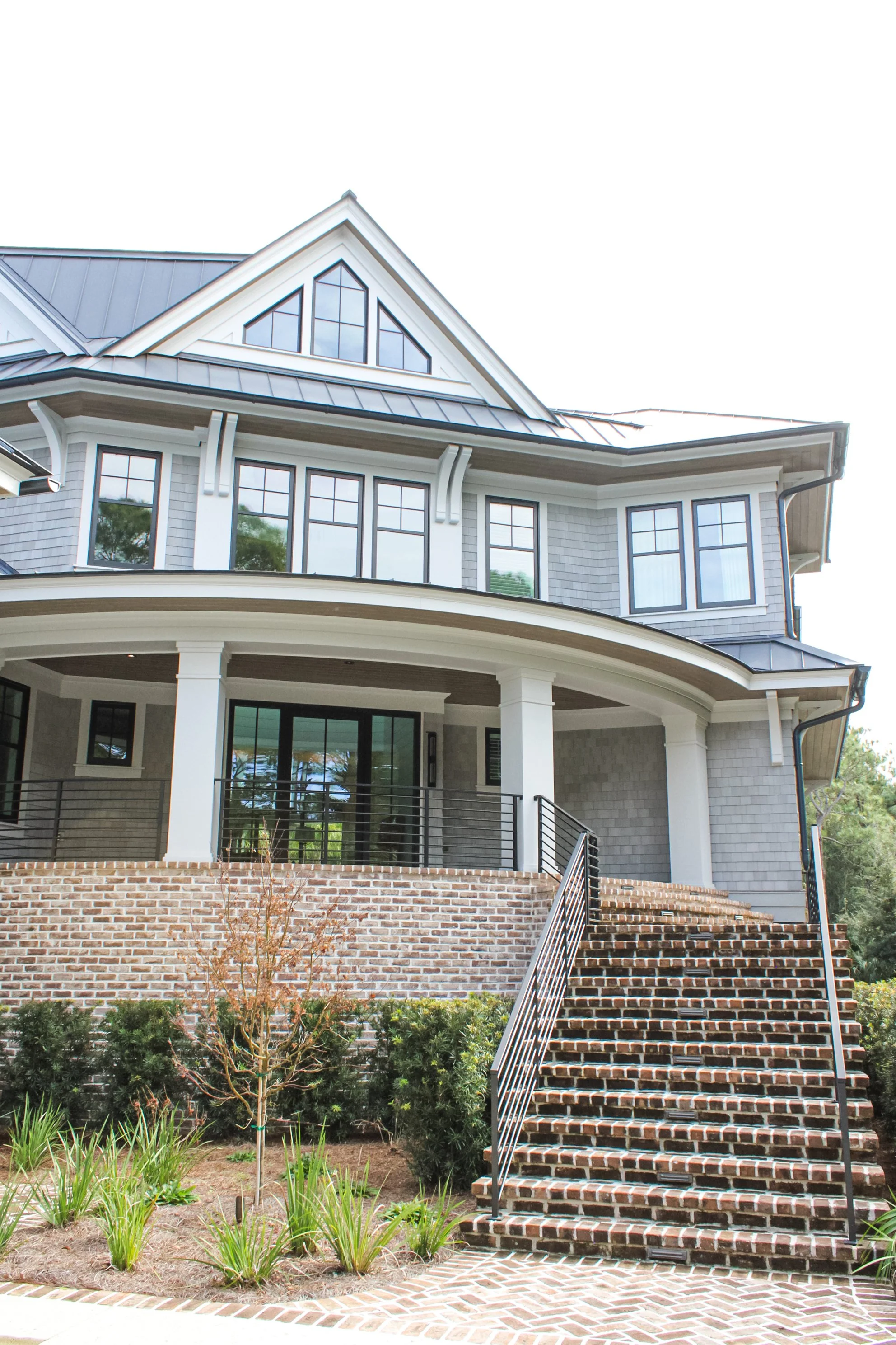 Luxury coastal home exterior painting project with trim and finishing work by NGR Painting LLC in Kiawah Island SC