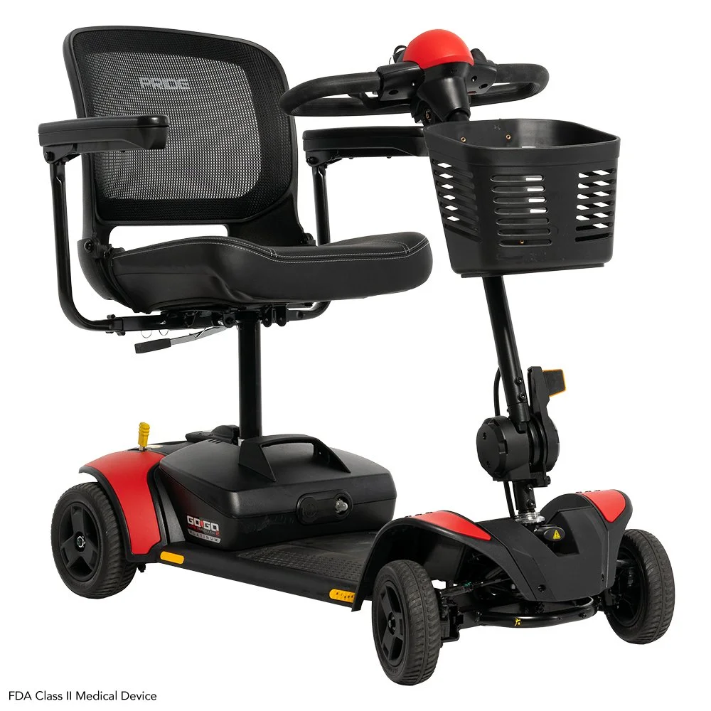 A black and red mobility scooter with a padded seat, mesh backrest, storage basket, and four wheels.