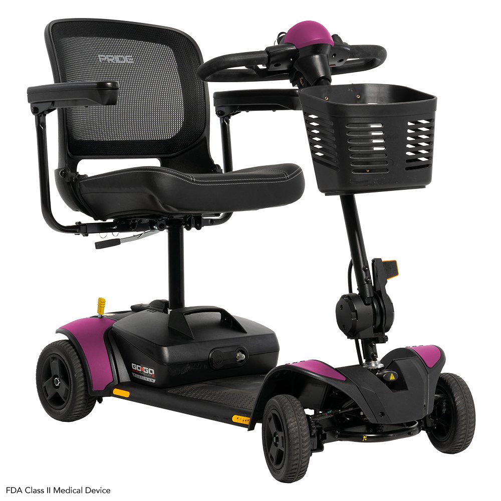 A black and purple mobility scooter with a cushioned seat, a front basket, and four wheels.