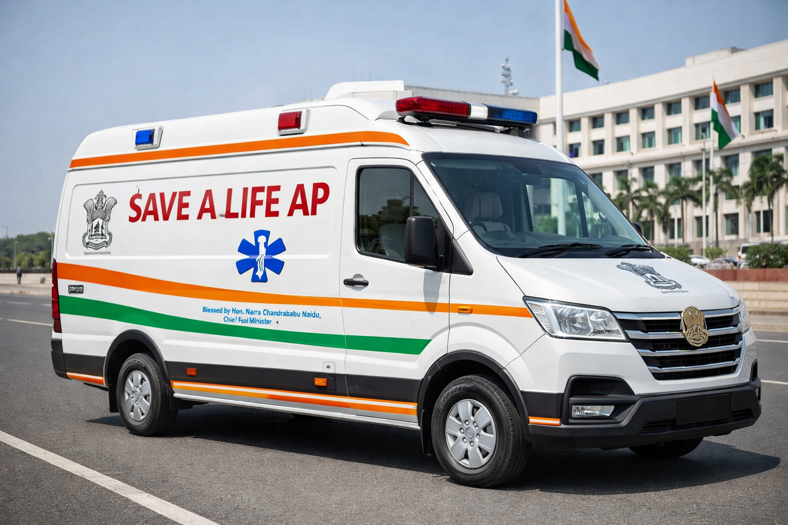 An ambulance vehicle with the inscription 'Save A Life AP' parked on the street, with flags and a large building in the background.