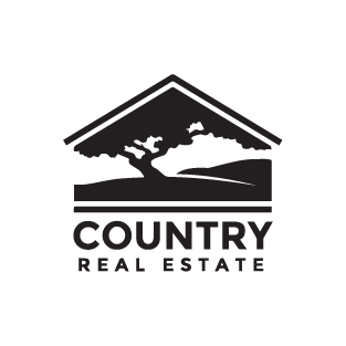 Logo of a real estate company featuring a mountain landscape, with the words 'Country Real Estate' below.