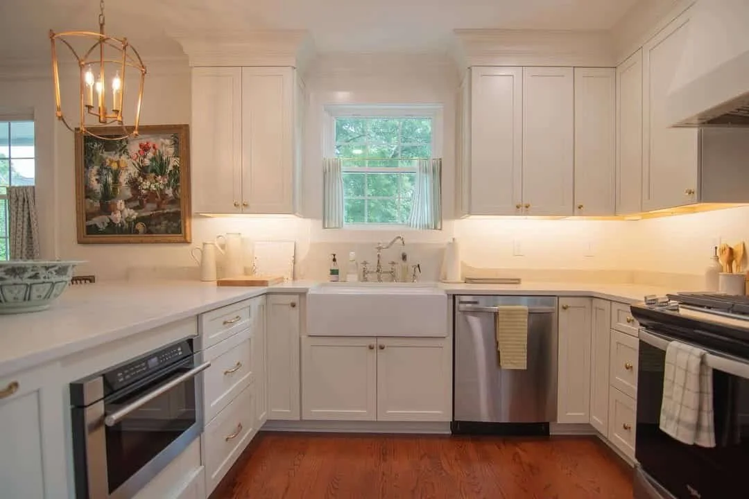 kitchen electrical renovations including under cabinet lighting and candle light styled lights above a kitchen counter