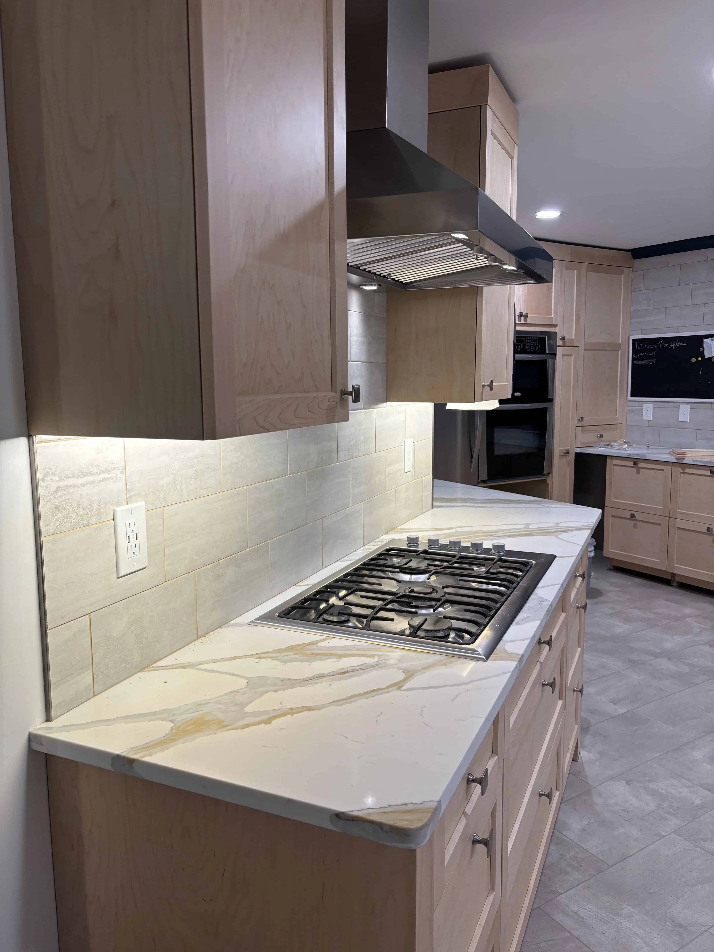 kitchen featuring recessed lighting and cabinet lighting installed by greenville electric