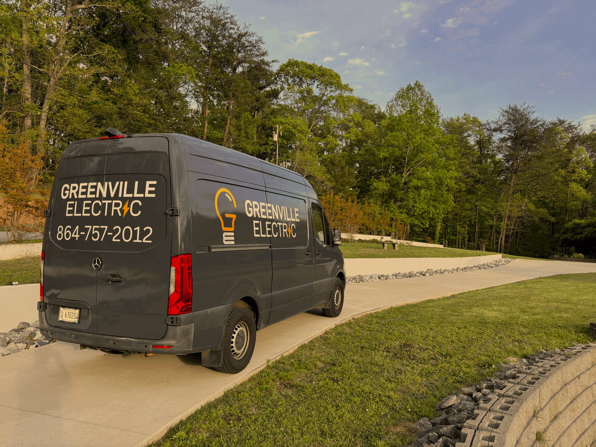 Greenville Electric van driving down the driveway