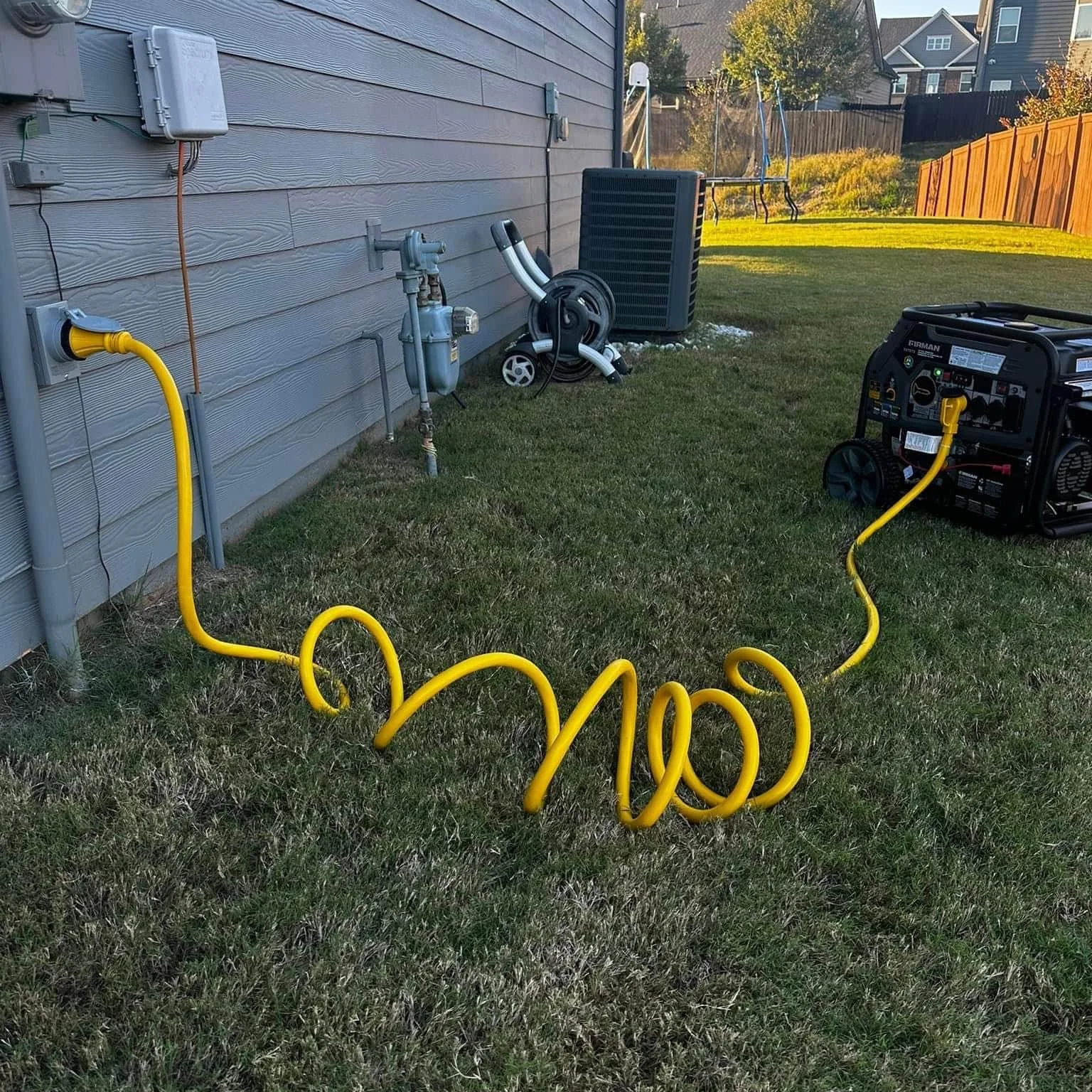 portable generator plugged into a house