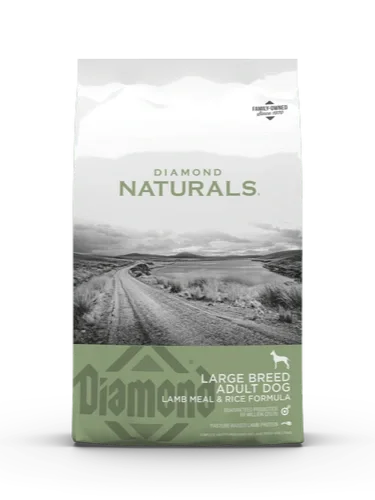Bag of Diamond Naturals large breed adult dog dog food with a landscape image of a dirt road and open fields, and text indicating it is lamb meal and rice formula.