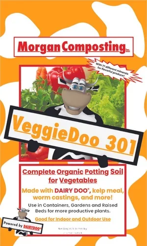 Packaging of VeggieDoo 301 organic potting soil with a cheerful cow mascot, red tomatoes, and green plants on the label, promoting indoor and outdoor vegetable gardening.