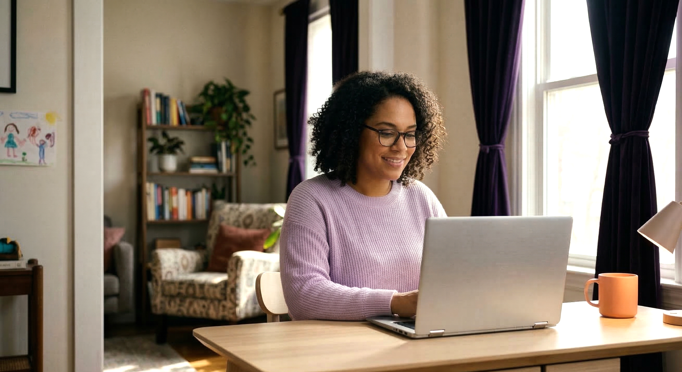 woman working from home during the day on her laptop