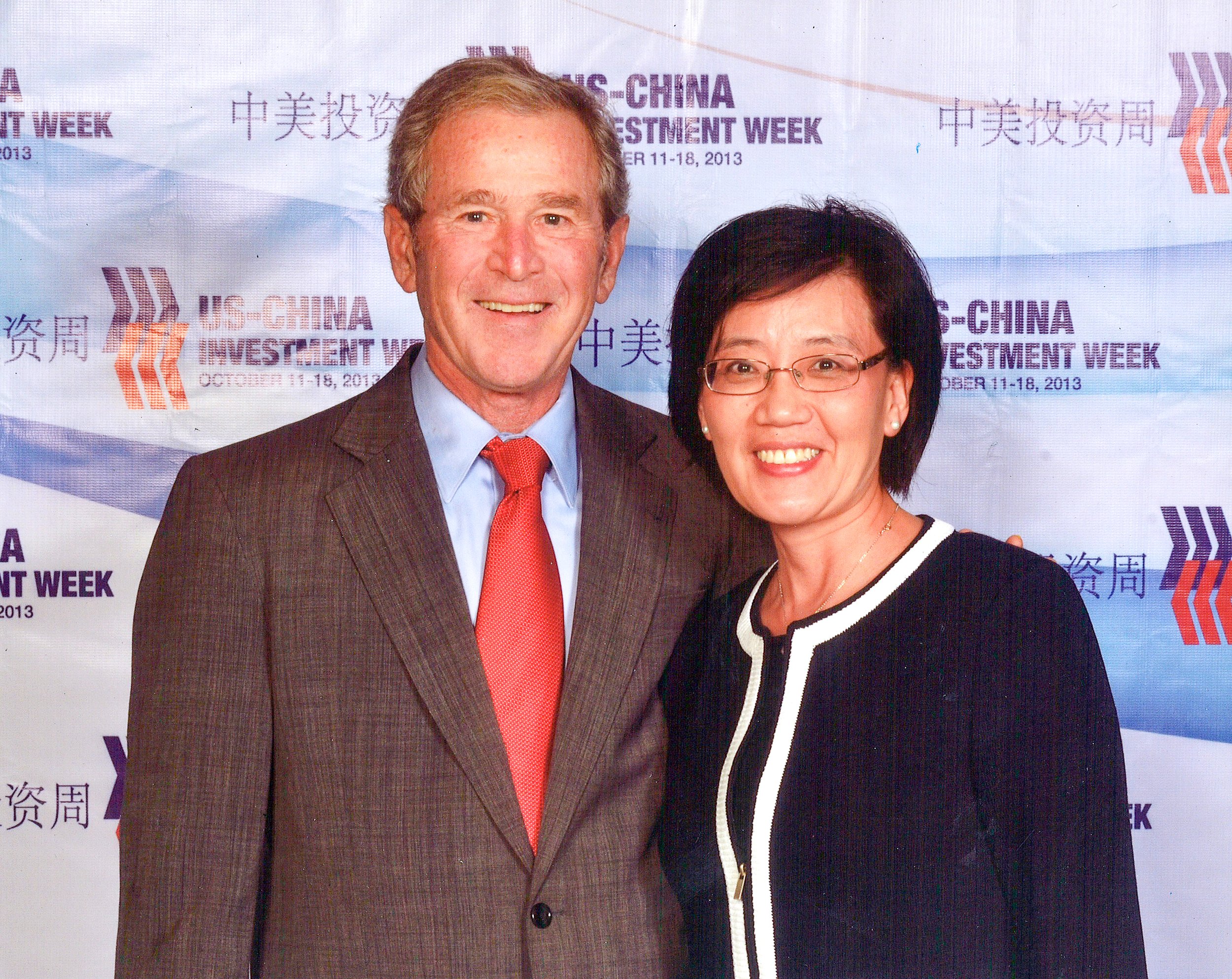 Irene with former US President George W. Bush at US-CHINA Investment Week in Dallas