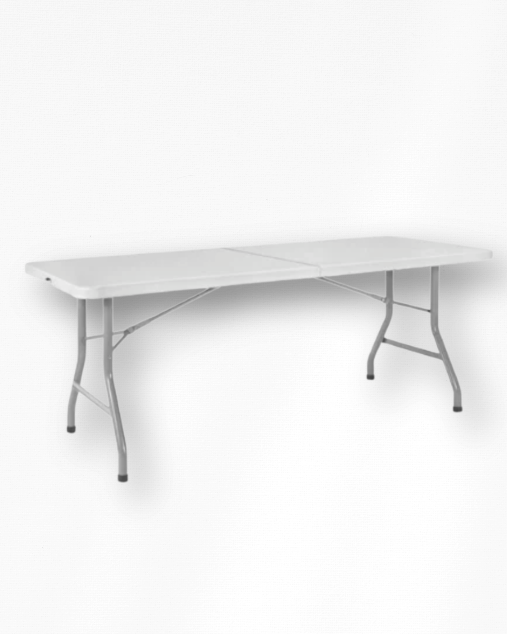 Empty white folding table against a white textured wall.
